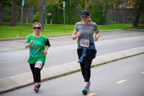two women running